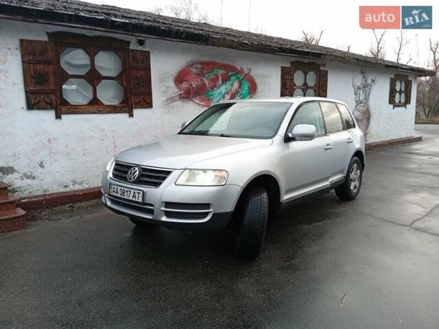 Серый Фольксваген Туарег, объемом двигателя 3.19 л и пробегом 158 тыс. км за 7000 $, фото 1 на Automoto.ua