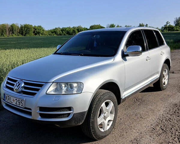 Сірий Фольксваген Туарег, об'ємом двигуна 2.5 л та пробігом 435 тис. км за 5000 $, фото 1 на Automoto.ua