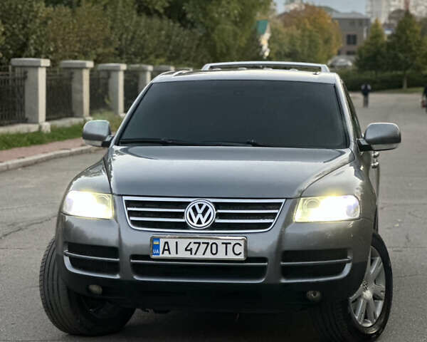 Серый Фольксваген Туарег, объемом двигателя 3 л и пробегом 220 тыс. км за 8250 $, фото 1 на Automoto.ua