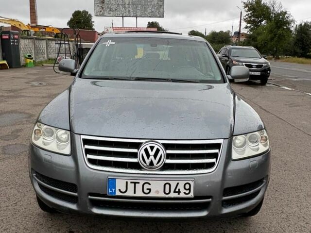 Серый Фольксваген Туарег, объемом двигателя 2.5 л и пробегом 340 тыс. км за 5000 $, фото 1 на Automoto.ua