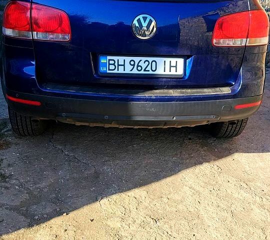 Серый Фольксваген Туарег, объемом двигателя 3 л и пробегом 200 тыс. км за 6000 $, фото 1 на Automoto.ua