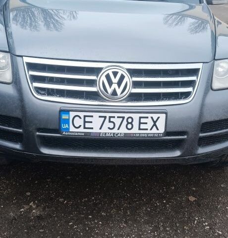 Сірий Фольксваген Туарег, об'ємом двигуна 2.5 л та пробігом 200 тис. км за 7500 $, фото 1 на Automoto.ua