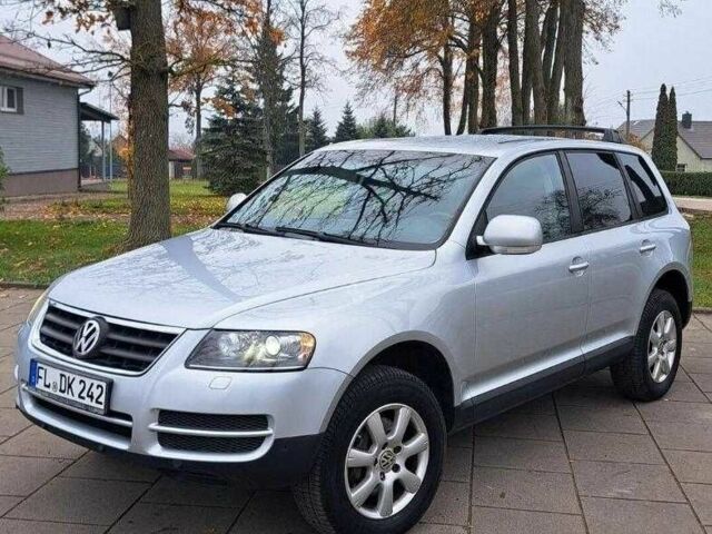 Серый Фольксваген Туарег, объемом двигателя 3 л и пробегом 307 тыс. км за 4500 $, фото 1 на Automoto.ua