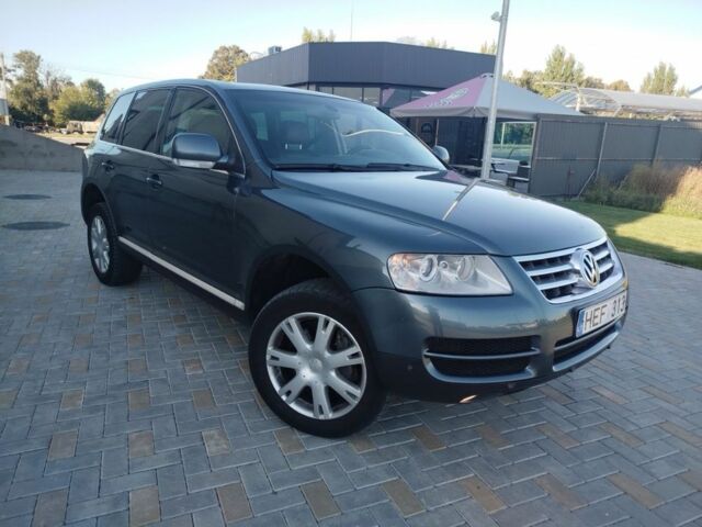 Сірий Фольксваген Туарег, об'ємом двигуна 3 л та пробігом 440 тис. км за 5900 $, фото 1 на Automoto.ua