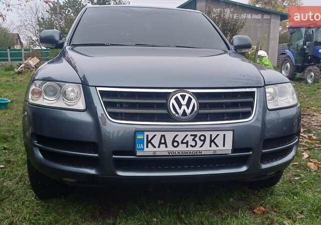 Сірий Фольксваген Туарег, об'ємом двигуна 2.5 л та пробігом 340 тис. км за 9600 $, фото 1 на Automoto.ua