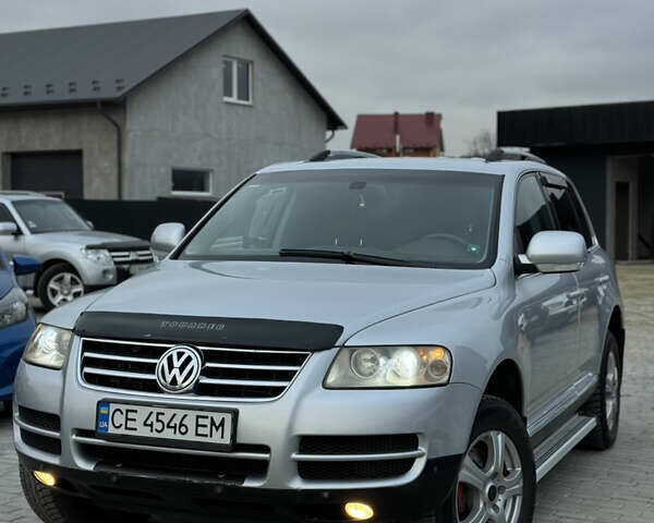 Серый Фольксваген Туарег, объемом двигателя 3 л и пробегом 295 тыс. км за 9700 $, фото 1 на Automoto.ua