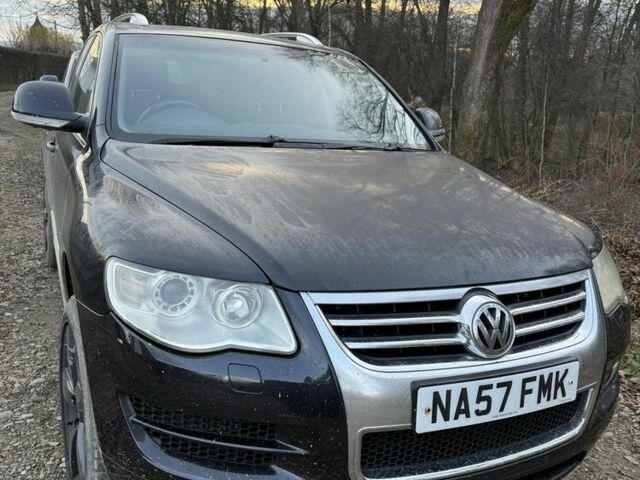 Сірий Фольксваген Туарег, об'ємом двигуна 3 л та пробігом 250 тис. км за 6150 $, фото 1 на Automoto.ua