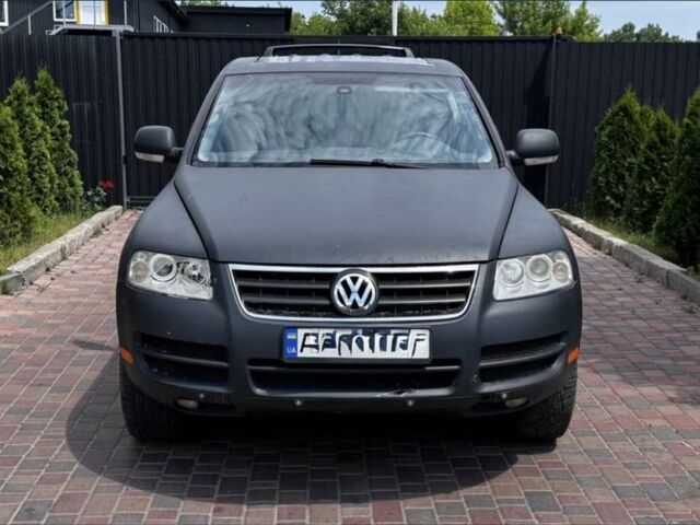 Серый Фольксваген Туарег, объемом двигателя 3.6 л и пробегом 245 тыс. км за 4200 $, фото 1 на Automoto.ua