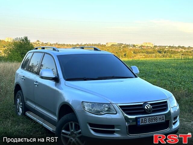 Фольксваген Туарег 2007 у Жмеренке на Automoto.ua Сірий Фольксваген Туарег, об'ємом двигуна 3 л та пробігом 244 тис. км за 10700 $, фото 1 на Automoto.ua