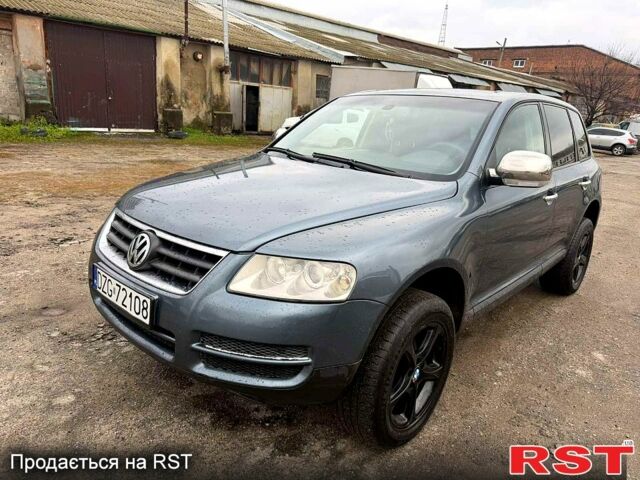 Серый Фольксваген Туарег, объемом двигателя 2.5 л и пробегом 248 тыс. км за 4300 $, фото 1 на Automoto.ua