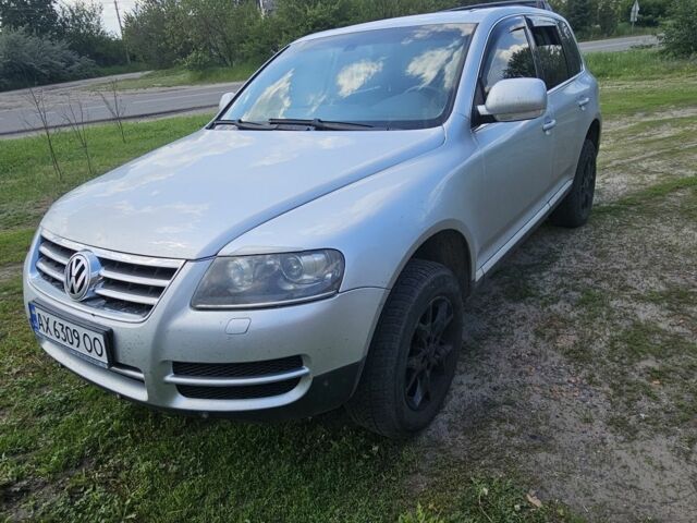 Серый Фольксваген Туарег, объемом двигателя 3.6 л и пробегом 207 тыс. км за 9000 $, фото 1 на Automoto.ua