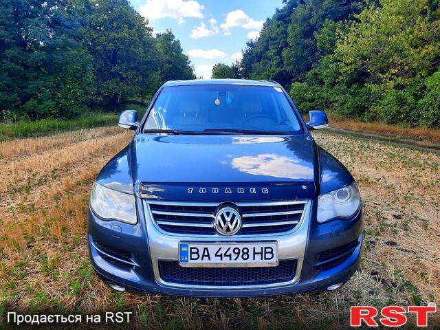 Сірий Фольксваген Туарег, об'ємом двигуна 3 л та пробігом 260 тис. км за 12000 $, фото 1 на Automoto.ua