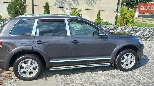 Сірий Фольксваген Туарег, об'ємом двигуна 3 л та пробігом 259 тис. км за 11734 $, фото 1 на Automoto.ua