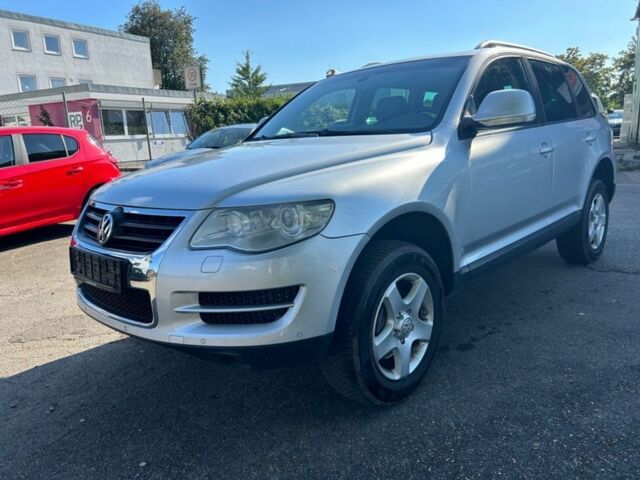 Сірий Фольксваген Туарег, об'ємом двигуна 3 л та пробігом 287 тис. км за 3321 $, фото 1 на Automoto.ua