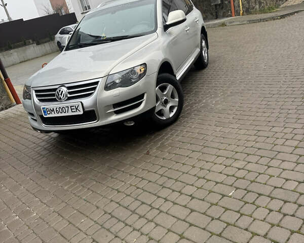 Серый Фольксваген Туарег, объемом двигателя 3 л и пробегом 369 тыс. км за 12500 $, фото 1 на Automoto.ua