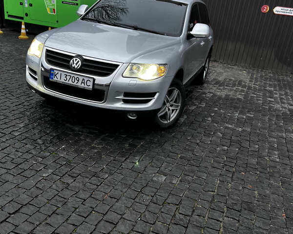 Сірий Фольксваген Туарег, об'ємом двигуна 3 л та пробігом 288 тис. км за 10700 $, фото 1 на Automoto.ua