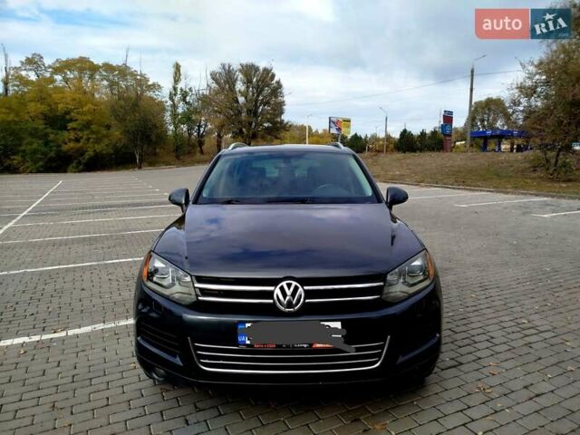 Сірий Фольксваген Туарег, об'ємом двигуна 3 л та пробігом 250 тис. км за 14500 $, фото 1 на Automoto.ua