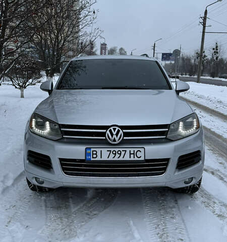 Серый Фольксваген Туарег, объемом двигателя 2.97 л и пробегом 220 тыс. км за 20000 $, фото 1 на Automoto.ua