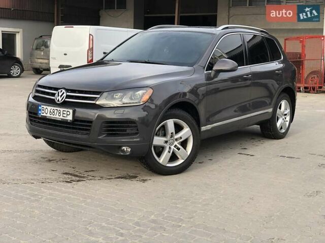Серый Фольксваген Туарег, объемом двигателя 2.97 л и пробегом 263 тыс. км за 15900 $, фото 1 на Automoto.ua