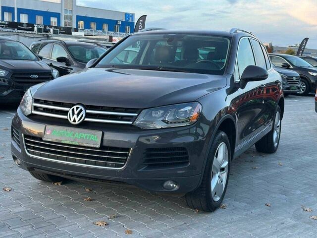 Серый Фольксваген Туарег, объемом двигателя 3 л и пробегом 296 тыс. км за 14490 $, фото 1 на Automoto.ua