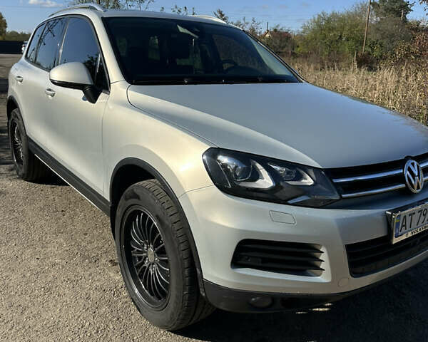 Серый Фольксваген Туарег, объемом двигателя 2.97 л и пробегом 296 тыс. км за 21000 $, фото 1 на Automoto.ua