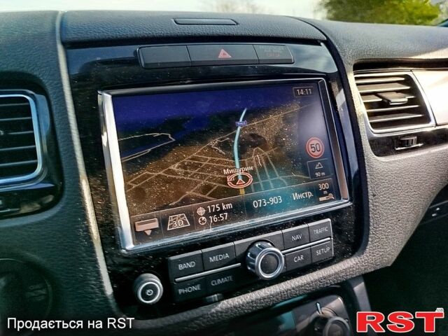 Сірий Фольксваген Туарег, об'ємом двигуна 3 л та пробігом 210 тис. км за 14900 $, фото 1 на Automoto.ua