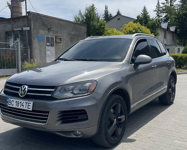 Сірий Фольксваген Туарег, об'ємом двигуна 3.6 л та пробігом 241 тис. км за 14600 $, фото 1 на Automoto.ua