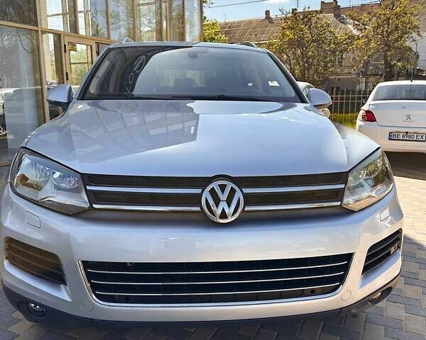 Серый Фольксваген Туарег, объемом двигателя 3 л и пробегом 286 тыс. км за 17900 $, фото 1 на Automoto.ua