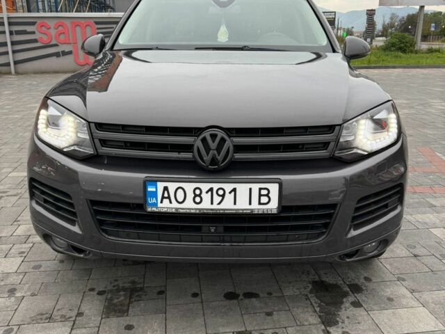 Серый Фольксваген Туарег, объемом двигателя 3 л и пробегом 277 тыс. км за 18300 $, фото 1 на Automoto.ua