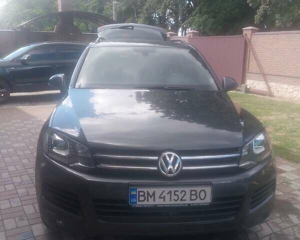 Серый Фольксваген Туарег, объемом двигателя 2.97 л и пробегом 289 тыс. км за 20500 $, фото 1 на Automoto.ua