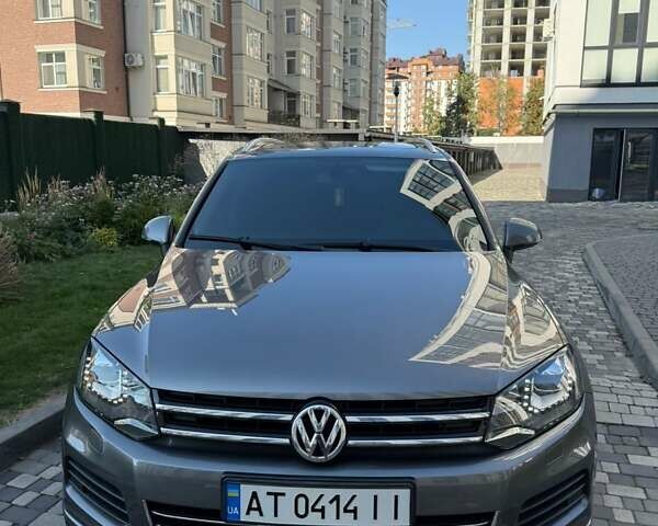 Серый Фольксваген Туарег, объемом двигателя 3 л и пробегом 267 тыс. км за 18800 $, фото 1 на Automoto.ua