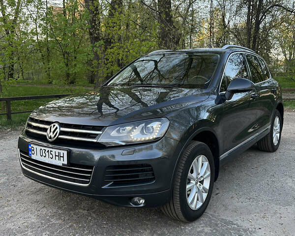 Сірий Фольксваген Туарег, об'ємом двигуна 2.97 л та пробігом 164 тис. км за 19899 $, фото 1 на Automoto.ua