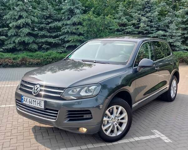 Серый Фольксваген Туарег, объемом двигателя 4.13 л и пробегом 303 тыс. км за 22800 $, фото 1 на Automoto.ua