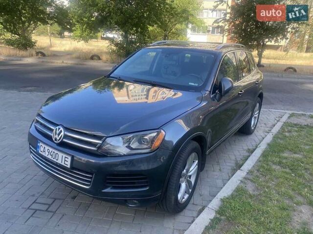 Сірий Фольксваген Туарег, об'ємом двигуна 2.97 л та пробігом 286 тис. км за 18700 $, фото 1 на Automoto.ua