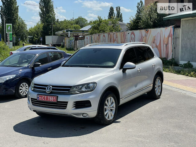 Серый Фольксваген Туарег, объемом двигателя 3 л и пробегом 210 тыс. км за 20500 $, фото 1 на Automoto.ua