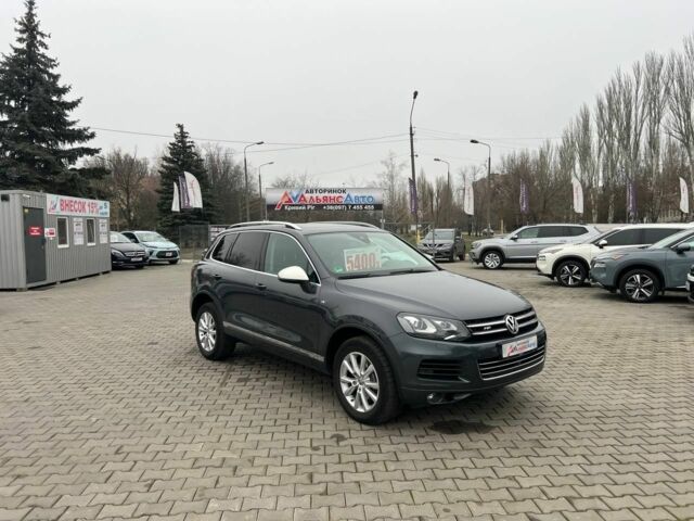 Серый Фольксваген Туарег, объемом двигателя 3 л и пробегом 223 тыс. км за 19500 $, фото 1 на Automoto.ua