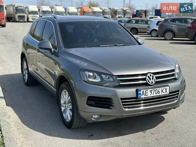 Серый Фольксваген Туарег, объемом двигателя 3 л и пробегом 295 тыс. км за 21500 $, фото 1 на Automoto.ua