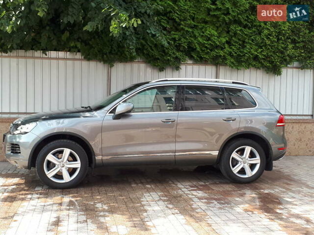 Сірий Фольксваген Туарег, об'ємом двигуна 3 л та пробігом 84 тис. км за 28331 $, фото 1 на Automoto.ua