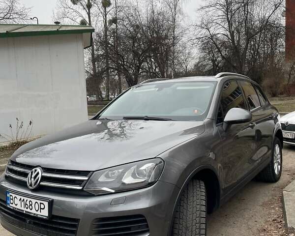 Сірий Фольксваген Туарег, об'ємом двигуна 3 л та пробігом 210 тис. км за 20700 $, фото 1 на Automoto.ua