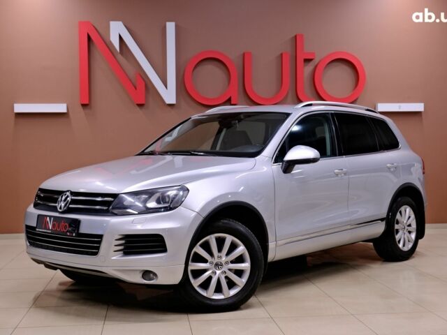 Серый Фольксваген Туарег, объемом двигателя 3 л и пробегом 219 тыс. км за 17900 $, фото 1 на Automoto.ua