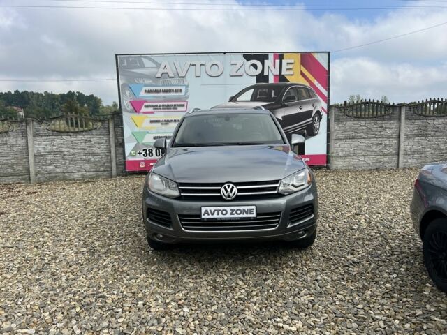 Серый Фольксваген Туарег, объемом двигателя 3 л и пробегом 309 тыс. км за 16599 $, фото 1 на Automoto.ua