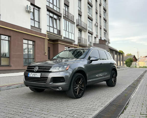 Серый Фольксваген Туарег, объемом двигателя 2.97 л и пробегом 261 тыс. км за 18000 $, фото 1 на Automoto.ua