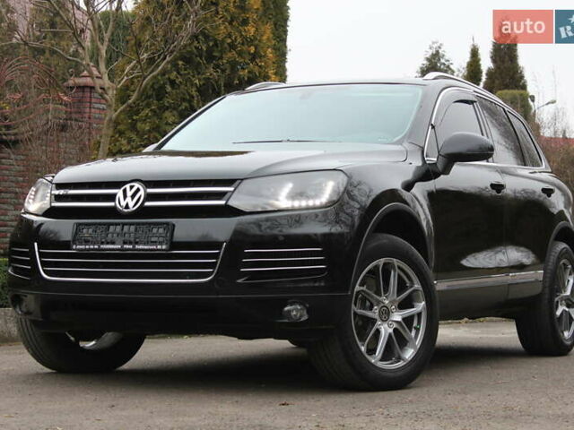 Серый Фольксваген Туарег, объемом двигателя 2.97 л и пробегом 183 тыс. км за 19900 $, фото 1 на Automoto.ua
