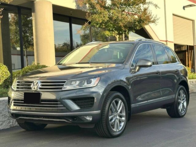 Серый Фольксваген Туарег, объемом двигателя 3 л и пробегом 72 тыс. км за 13600 $, фото 1 на Automoto.ua