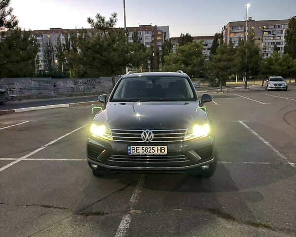 Серый Фольксваген Туарег, объемом двигателя 2.97 л и пробегом 186 тыс. км за 23500 $, фото 1 на Automoto.ua