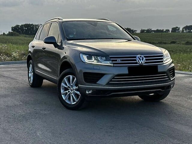 Серый Фольксваген Туарег, объемом двигателя 3 л и пробегом 139 тыс. км за 23200 $, фото 1 на Automoto.ua