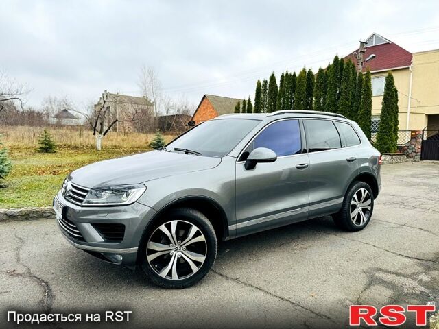 Серый Фольксваген Туарег, объемом двигателя 3 л и пробегом 109 тыс. км за 31500 $, фото 1 на Automoto.ua