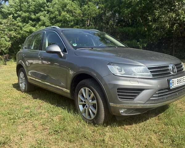 Серый Фольксваген Туарег, объемом двигателя 3 л и пробегом 223 тыс. км за 30000 $, фото 1 на Automoto.ua