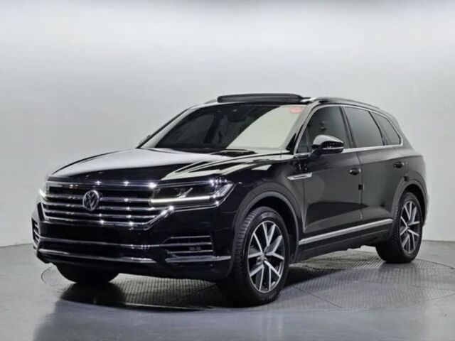 Серый Фольксваген Туарег, объемом двигателя 3 л и пробегом 88 тыс. км за 51200 $, фото 1 на Automoto.ua