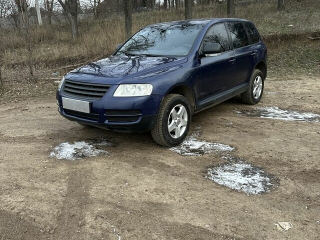 Синій Фольксваген Туарег, об'ємом двигуна 2.5 л та пробігом 321 тис. км за 3879 $, фото 1 на Automoto.ua